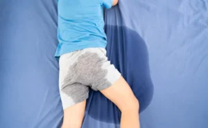 Bedwetting is common, especially in younger children.
It usually resolves on its own as children grow and their bladder control develops.
However, there are times when it might signal an underlying issue that needs a specialist's attention.