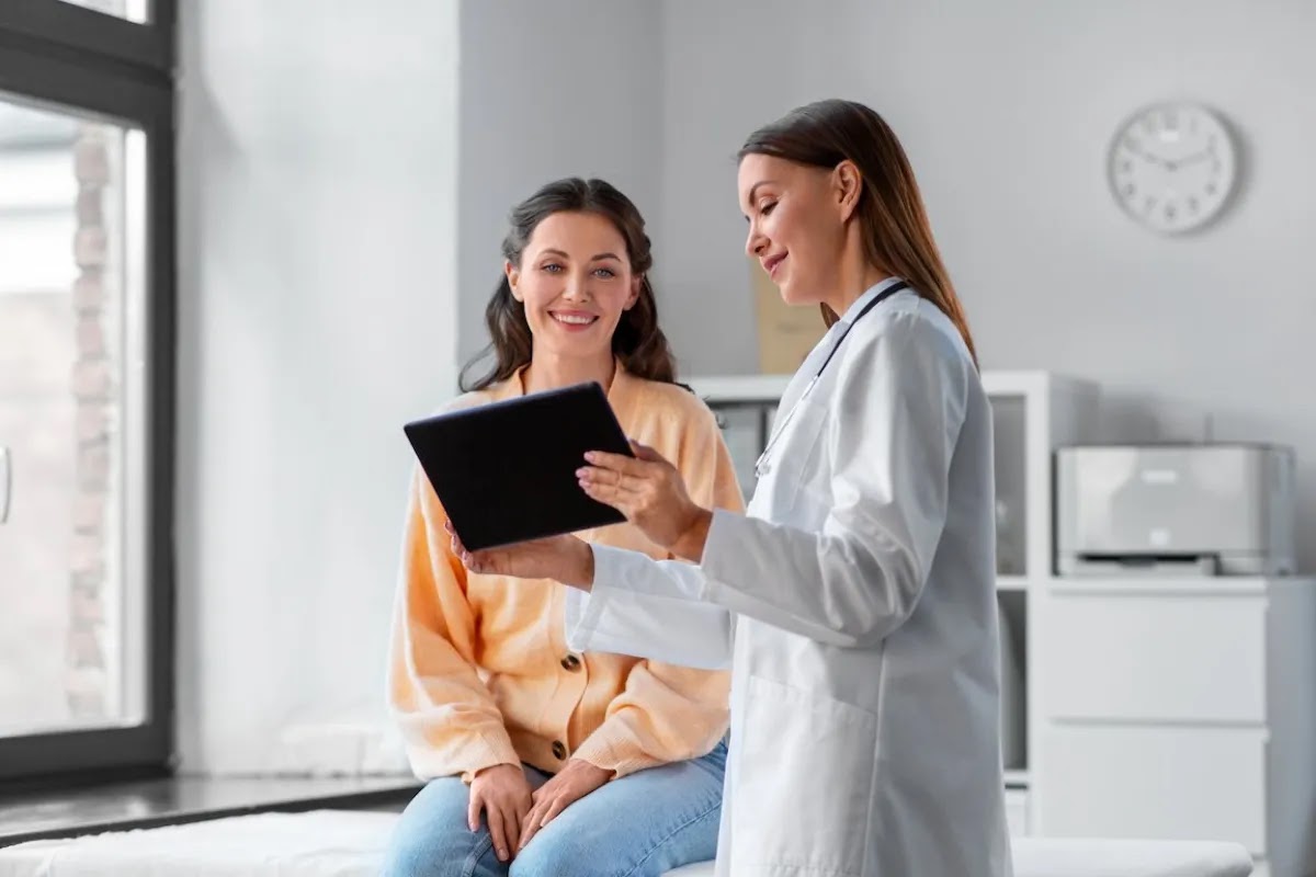 Urologist discussing treatment options with a patient about urinary health.